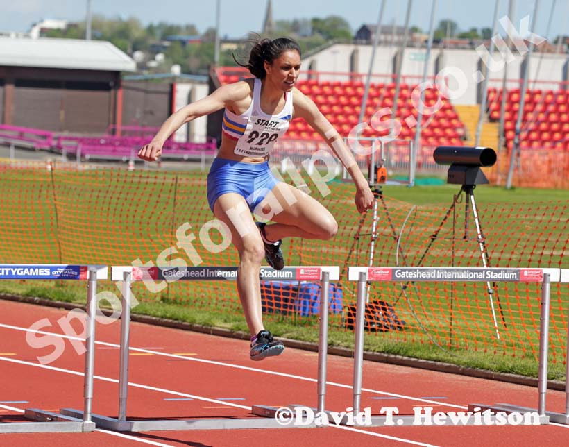 Nisha Desai (Trafford0 wins the 400 metres hurdles at the North Eastern Champs, Gateshead.